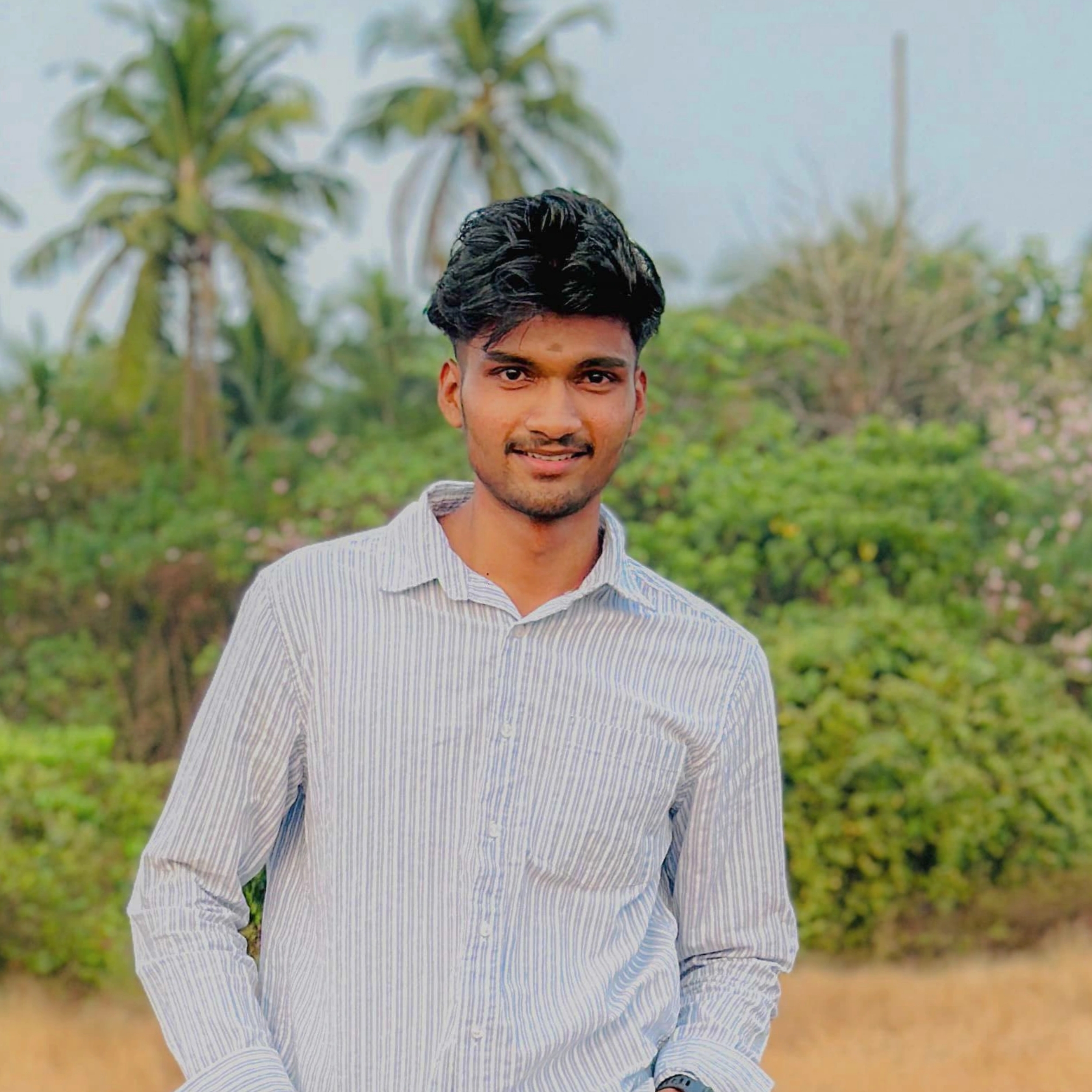 Arjun B